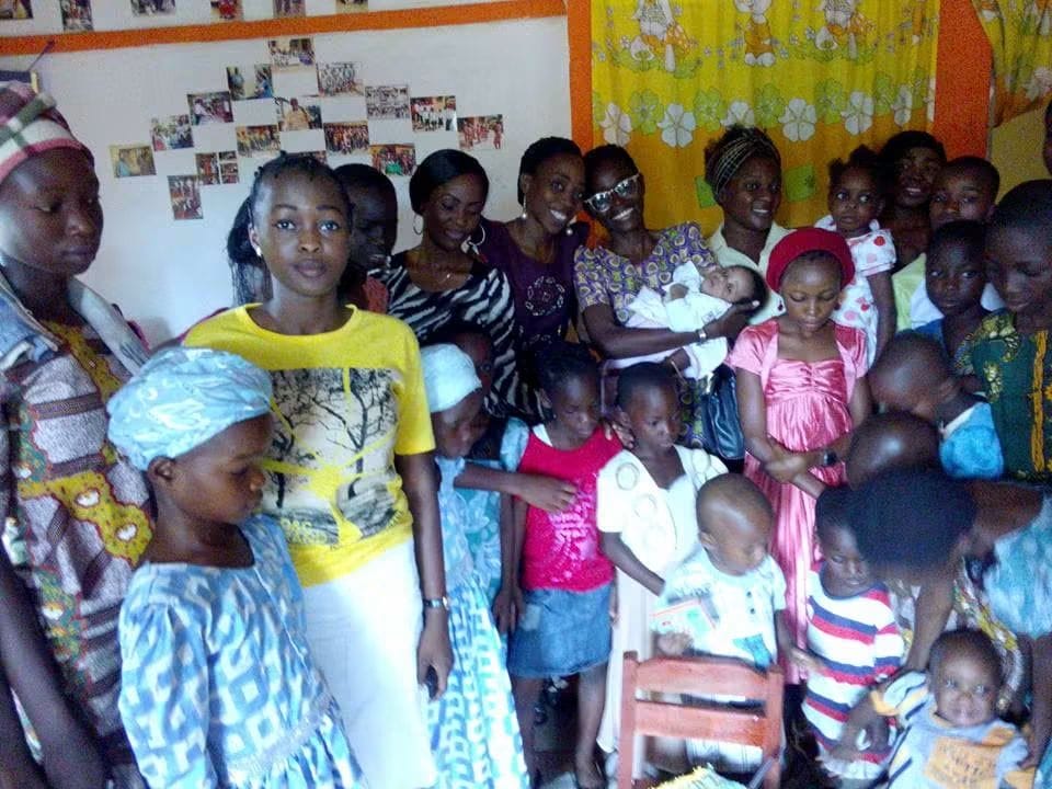 Ministry volunteers gathered with children during an outreach visit